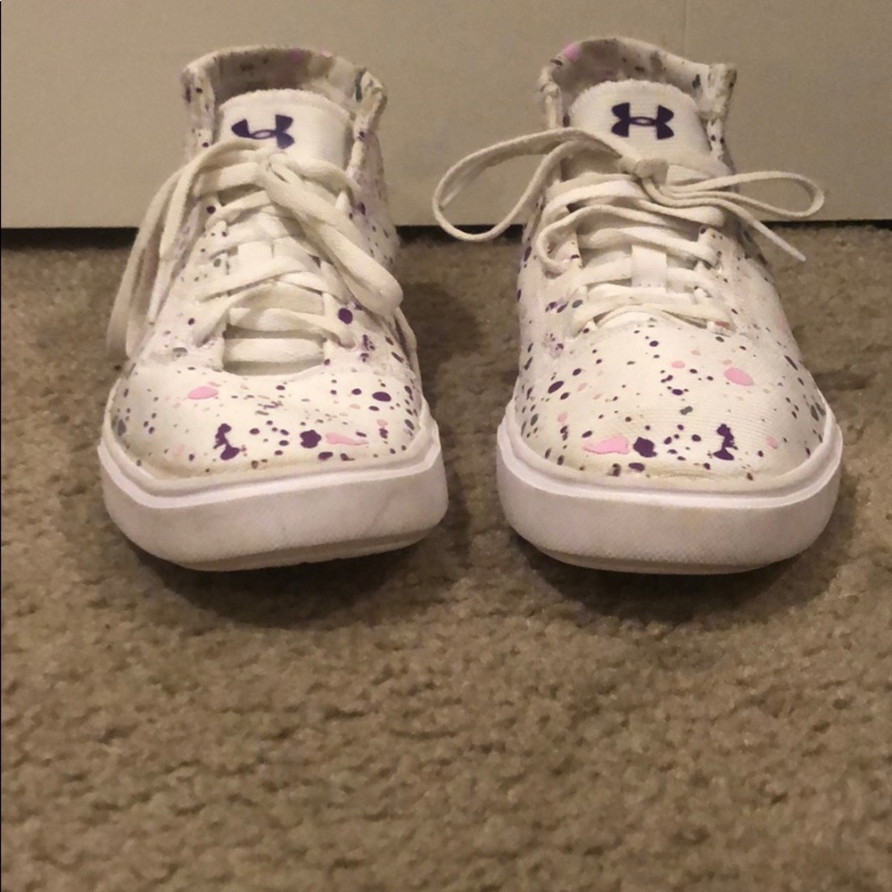 Under armour paint splattered shoes.